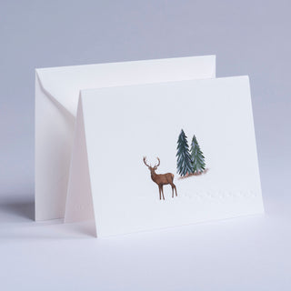 Hirsch in Winterlandschaft als passendes Motiv zu Weihnachten