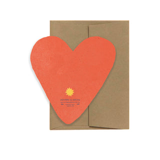 Karte in Herzform gestanzt